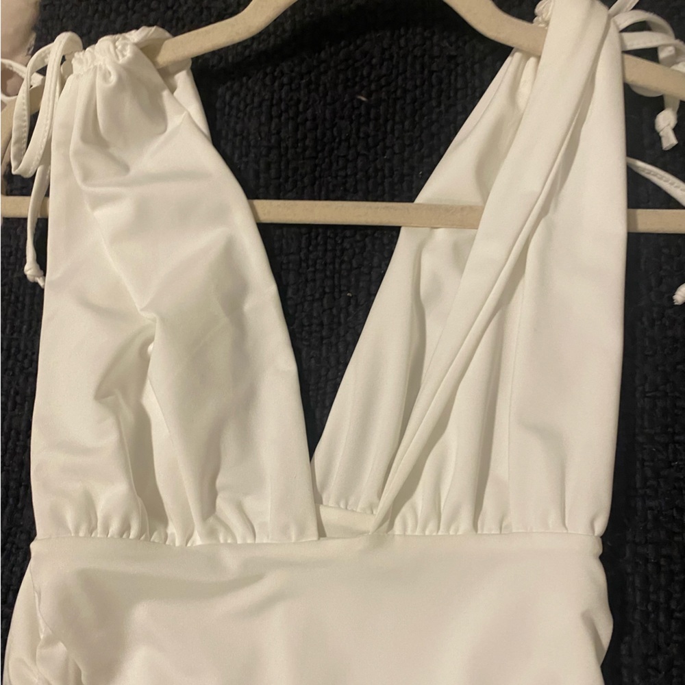 V neck white dress with ruched detailing